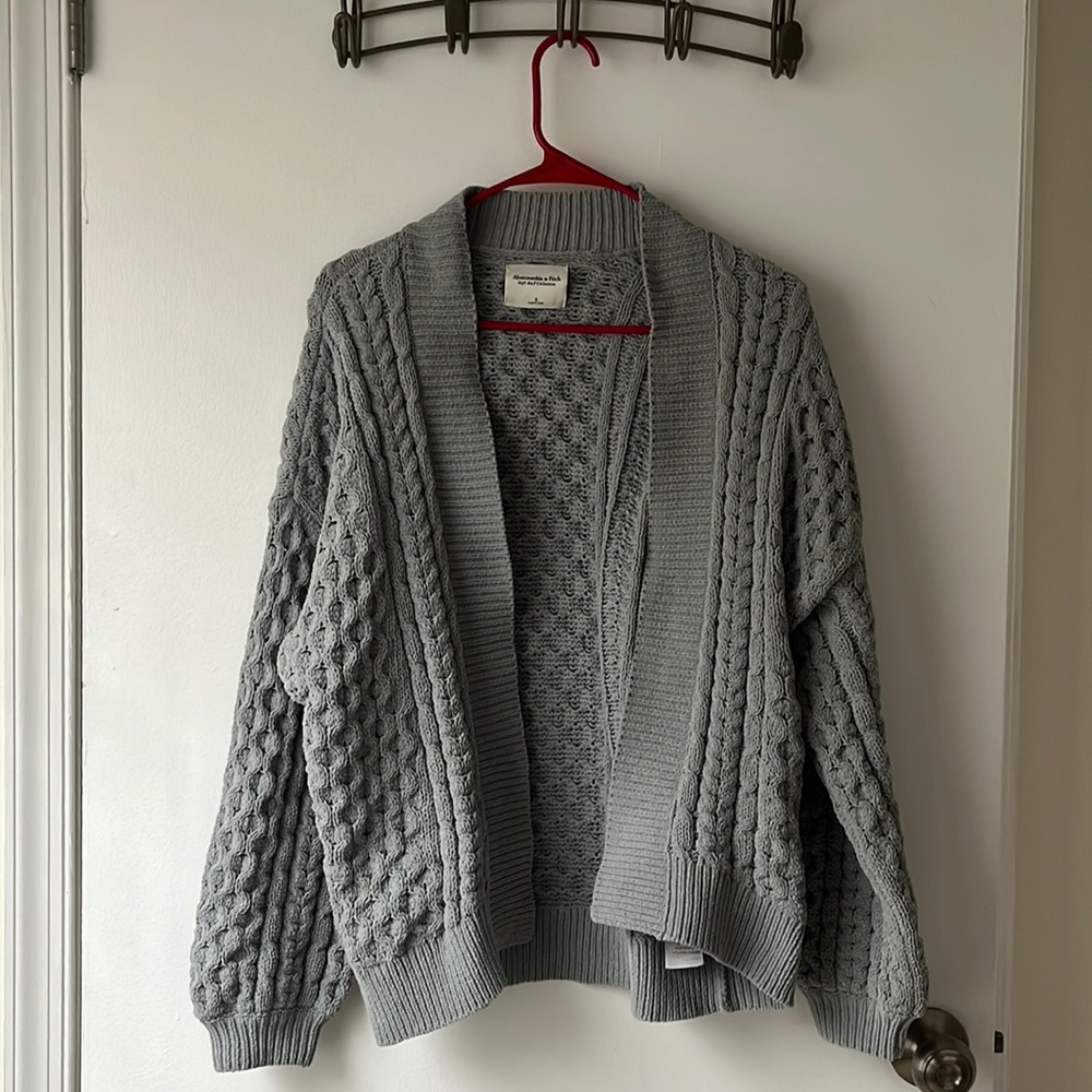 A teal cardigan size small